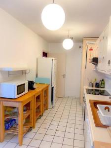 Appartements 2 chambres, balcon, parking gratuit - wifi : photos des chambres