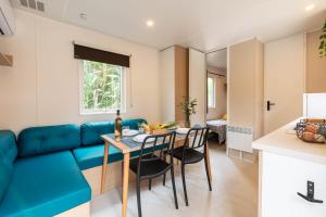 Le Palmier, mobil-home sans vis-à-vis idéalement situé entre mer et vignes