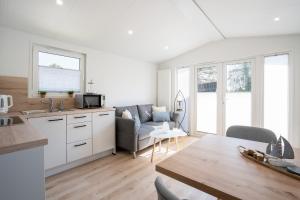 Ostseecamp Lübecker Bucht Ferienhaus "Little Hampton"