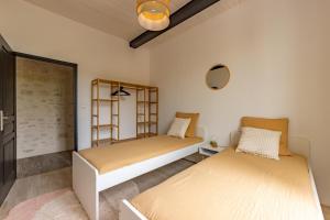 Appartements L'Elegant T3 du Quercy Blanc - Parking facile : photos des chambres