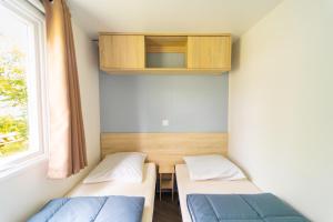 Campings Mobil-home 6/8 personnes - Camping Siblu **** Domaine de Dugny : photos des chambres