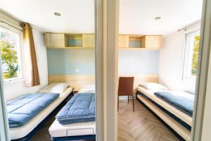 Campings Mobil-home 6/8 personnes - Camping Siblu **** Domaine de Dugny : photos des chambres