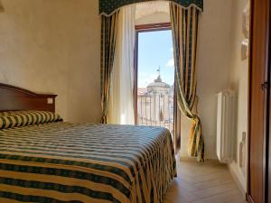 Rooms Dimora Arco - Affitti Brevi Italia