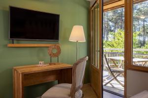 Appart'hotels Domaine du Ferret Restaurant & Spa : photos des chambres