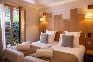 Appart'hotels Domaine du Ferret Restaurant & Spa : photos des chambres