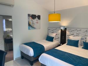 Contact Hotels Les Pierres Dorees : photos des chambres