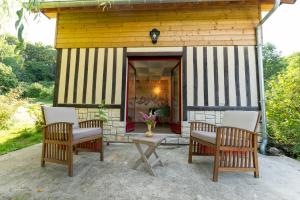 B&B / Chambres d'hotes L'Herbe Haute : Cottage - Vue sur Jardin