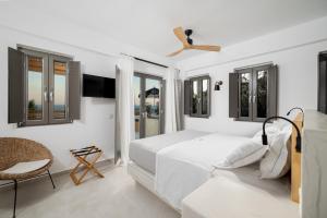 Mnḗmē Suites & Villas