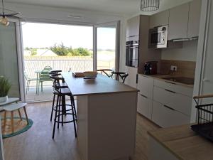 Appartements La Terrasse du SloI - Proche plage : photos des chambres