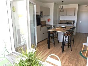 Appartements La Terrasse du SloI - Proche plage : photos des chambres