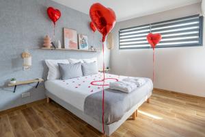 Appartements L'entre deux-suite romantique - jacuzzi privatif - 1 petit dejeuner pour 2 OFFERT : photos des chambres