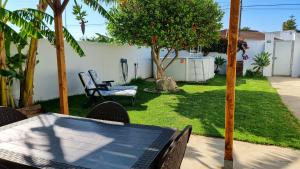 Apartamento privado con jardin, piscina elevada y bbq