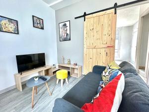 Appartements Aux pieds du Vieux-Mans : cocooning et lumineux : photos des chambres