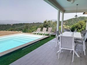 Villas Tres jolie villa avec vue mer panoramique : photos des chambres