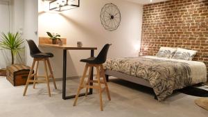 Appartements Studio Cosy, Spa et jardin privatif a 4 min de Cambrai : photos des chambres