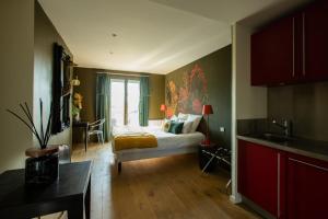 Appartements LA VILLA FLEURY - Apparthotel de standing - La Rubis brillance et douceur : photos des chambres