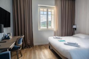 Hotels Hotel de la Baie : photos des chambres
