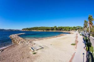 Appartements jardin plage avec 2 paddles, du calme et de l'ombre : photos des chambres