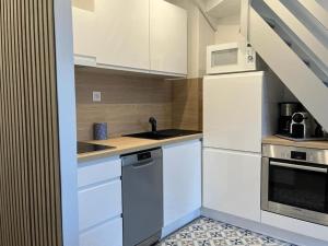Appartements Charmant Duplex, 300 m de la mer : photos des chambres