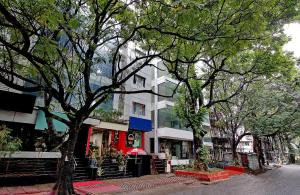 Capital O Elegant Amethyst Business Hotel Near Ragigudda Sri Prasanna Anjaneyaswamy Temple