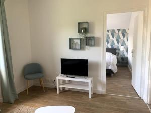 Appartements Le Nid des Fees appartement T3 renove acces jardin : photos des chambres