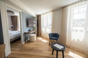 Hotels Hotel de la Baie : photos des chambres