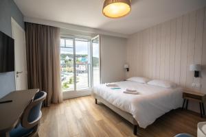Hotels Hotel de la Baie : photos des chambres