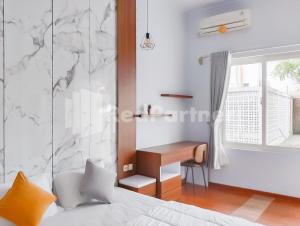 Khayrizsan Guest House Mitra RedDoorz