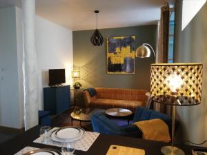 Appartements Appartement sous les remparts : photos des chambres