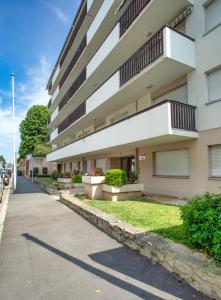 Appartements LE COSY avec piscine, balcon et parking : photos des chambres