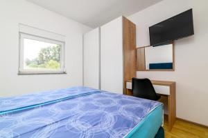 Holiday house with a swimming pool Medulin - 21049