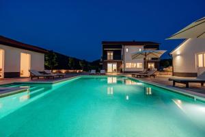 Vila Agape with a pool, football and tennis court