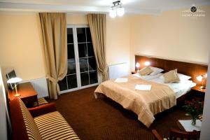 Quadruple Room with Balcony room in Dworek Jamneński