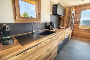 Chalets Chalet 14p vue lac, spa et sauna : photos des chambres