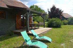 Maisons de vacances Chalet au bord d'un etang, pres d'une ferme pedagogique : photos des chambres