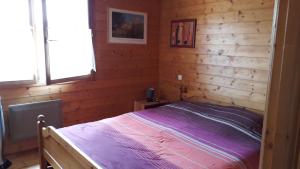 Maisons de vacances Chalet au bord d'un etang, pres d'une ferme pedagogique : photos des chambres
