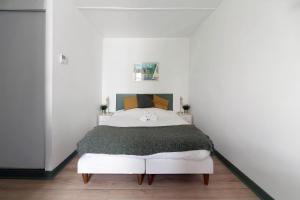 Appart'hotels Residence Bains Callou situee face aux thermes : photos des chambres