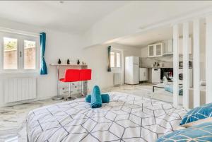 Appartements Appartement climatise a Beziers avec Jacuzzi & Retroprojecteur - Le Palais des Glaces : photos des chambres