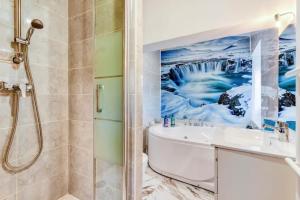 Appartements Appartement climatise a Beziers avec Jacuzzi & Retroprojecteur - Le Palais des Glaces : photos des chambres