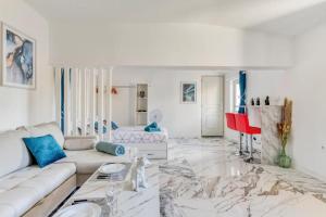 Appartements Appartement climatise a Beziers avec Jacuzzi & Retroprojecteur - Le Palais des Glaces : photos des chambres