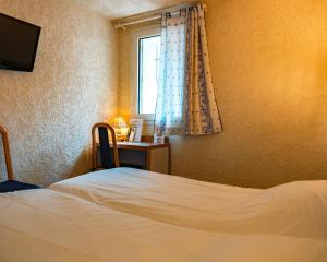 Hotels Logis Heraclee : Chambre Lits Jumeaux