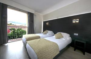 Hotels Le Cheval Blanc : photos des chambres