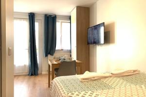 Appartements Cosy studio M1 RER BC500m Orly 20 min Netflix : photos des chambres