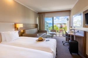 Adjacent Family Room with Garden View room in Holiday Inn Cannes an IHG Hotel