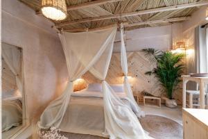 Studio with Garden View room in Biophilia Luxury Lofts