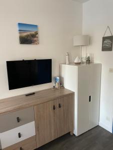 Appartements Studio a 2 min a pied de la plage, du port ostreicole et a 5 min du centre-ville ! : photos des chambres
