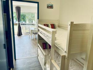 Appartements Studio a 2 min a pied de la plage, du port ostreicole et a 5 min du centre-ville ! : photos des chambres