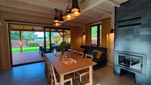 Nad Kalwą - Mazury całoroczny dom do wynajęcia z widokiem na jezioro - pomost - łódka - rower wodny