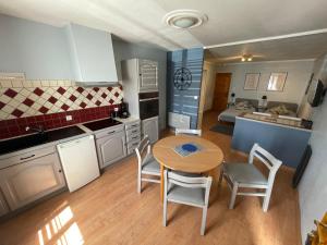Appartements Le Studio : photos des chambres