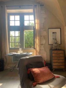 Appartements Au pays de Gide appart feutre dans un chateau : photos des chambres